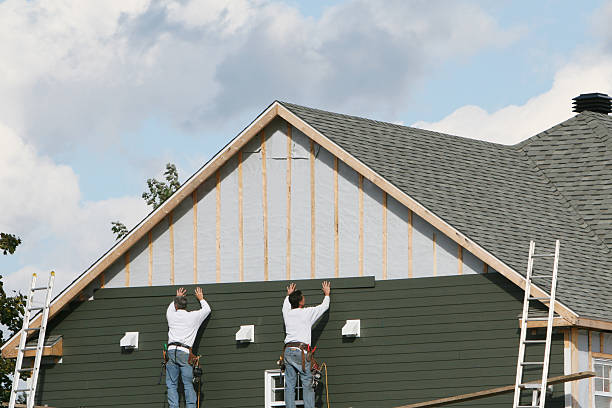 Professional Emergency Siding Repair technician working in Danvers, IL